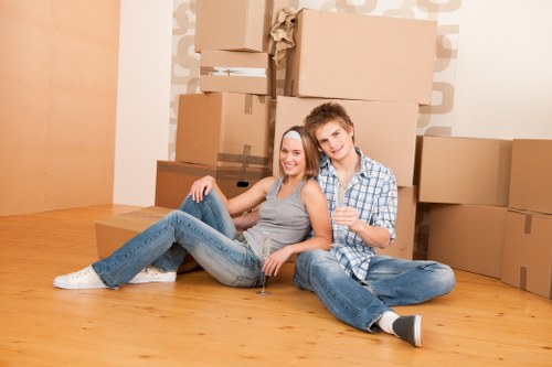 Staff checking furniture and access points before a move