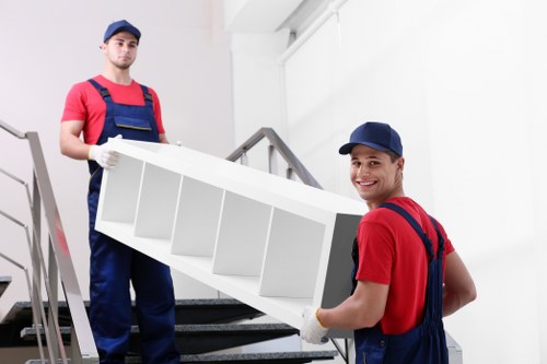 Professional packing materials and labelled boxes in a London home move