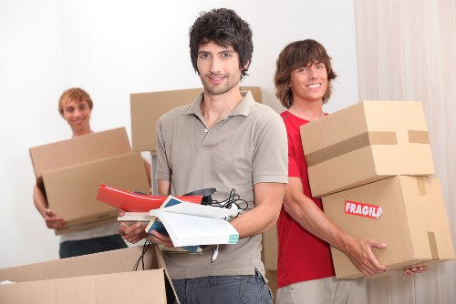 Moving team preparing a London house removal on a residential street