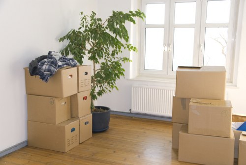 Packed belongings prepared for a man and van collection