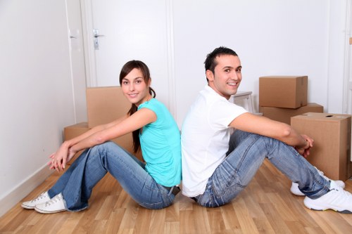 Packed office equipment and furniture ready for relocation