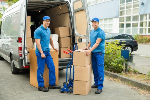 Local team collecting office furniture in London commercial property