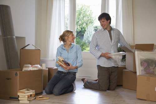 Moving van and boxes during a London house relocation near residential homes