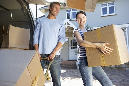 Prepared moving boxes and furniture for a London removals van