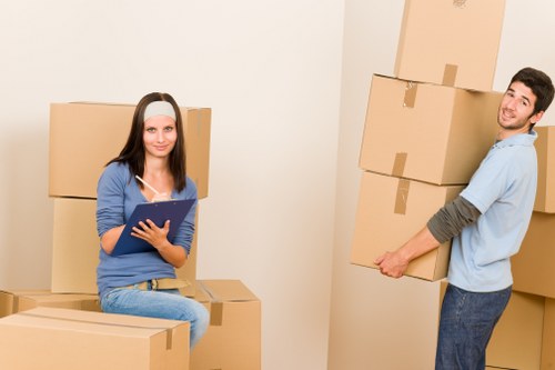 Loading furniture into a removal van for a city relocation